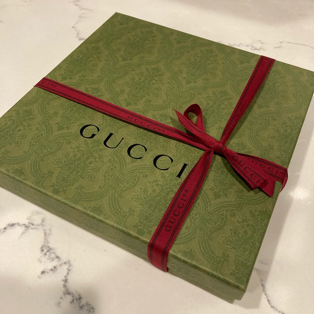 Brand new Authentic Gucci gift box with ribbon and tissue paper